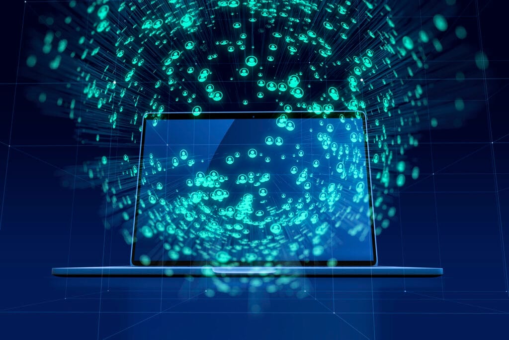 Sodobna 3D ilustracija prenosnika, iz katerega se širijo digitalni podatki in uporabniške ikone – simbol za pretok informacij, podatkovno analitiko ali množično povezljivost.